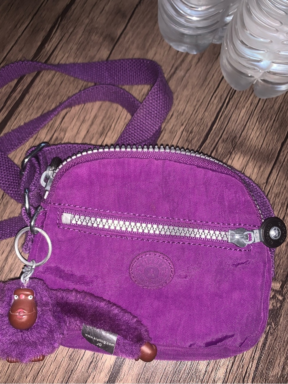 Kipling Vibrant Purple Mini Crossbody with Plush Monkey Charm